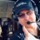 Anthony DOhrmann prepard to fly a plane with thumbs up