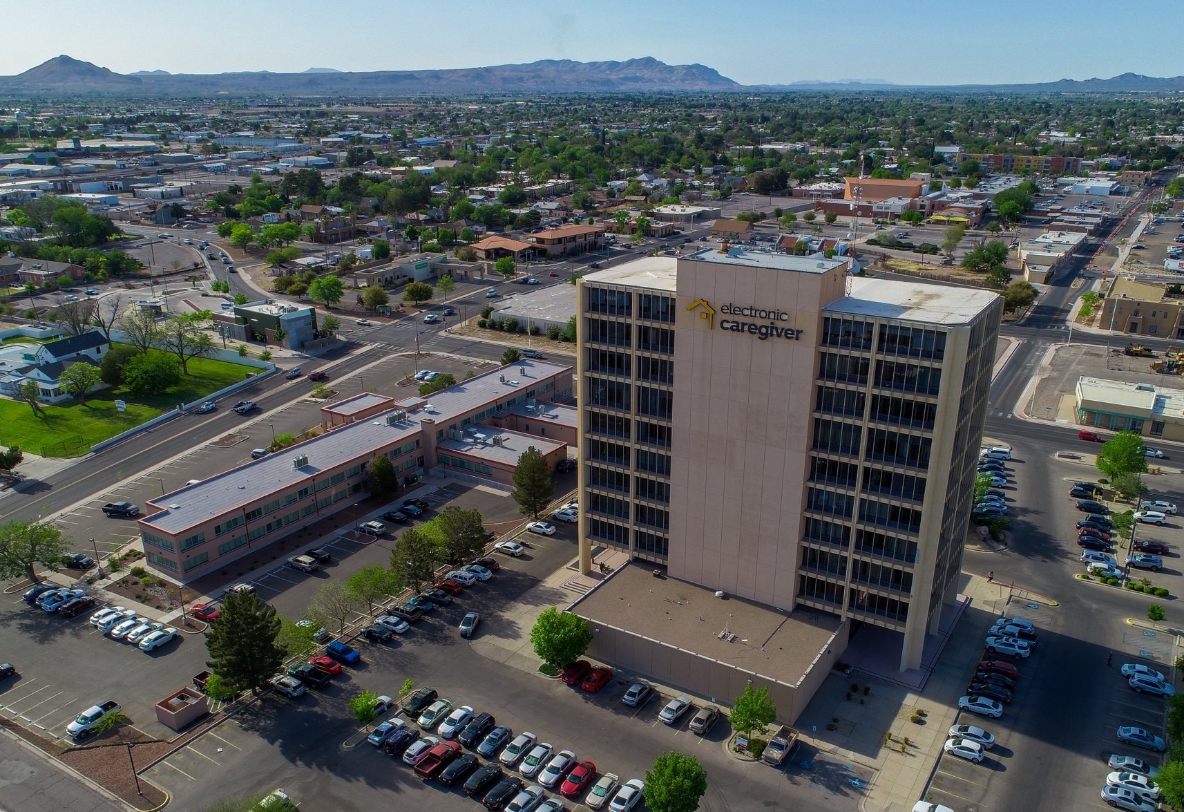 Electronic Caregiver Building High Rise Image from Drone
